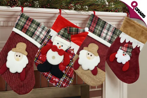 From QR34 Spread the Holiday Cheer with a Pair of Christmas Themed Gift Stockings - Choose from Santa & Snowman Designs! (Up to QR138 Value)